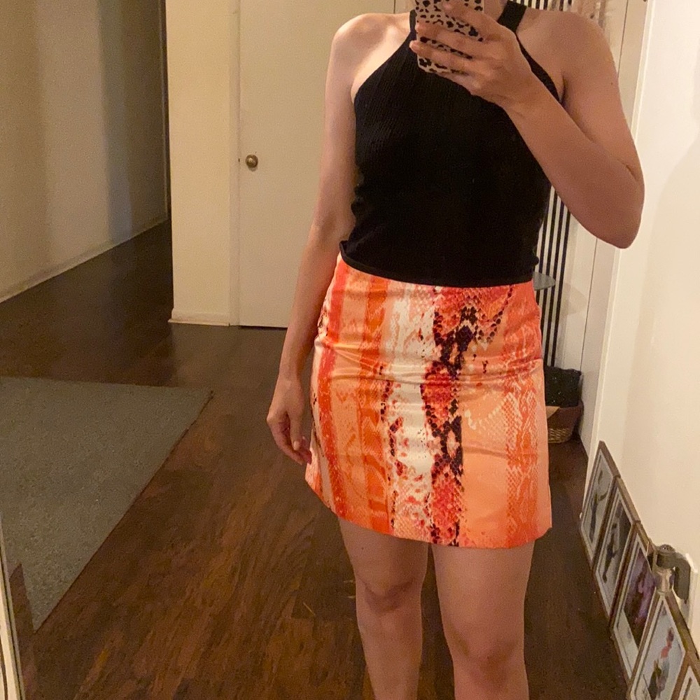 Multi colored orange and black snakeprint skirt